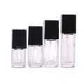 Custom 20ml 30ml 35ml 40ml square glass cosmetic lotion bottle with black lid